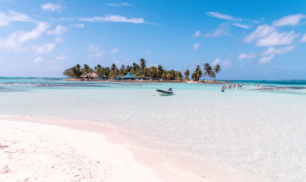 view on an San Andres Island covered by palm trees and surround by the Caribbean ocean which has to be part of your 2 weeks Colombia itinerary.