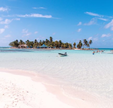view on an San Andres Island covered by palm trees and surround by the Caribbean ocean which has to be part of your 2 weeks Colombia itinerary.
