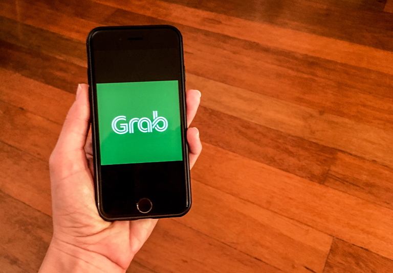 Grab app logo on a phone screen