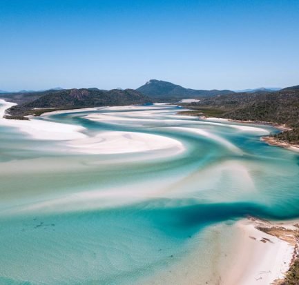 Whitsundays, one of the best known landmarks in Australia, turquoise blue water with white sand swirling around