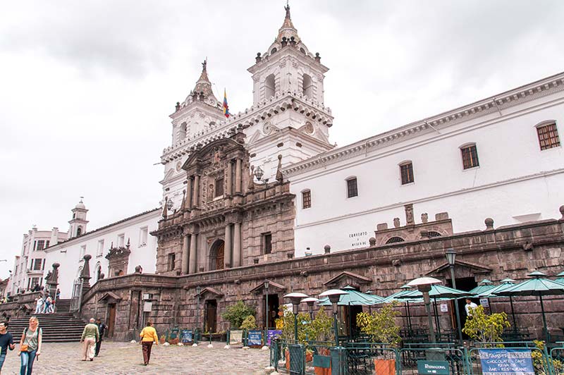white and grey buildings in Plaza San Francisco in Quito, the capital of Ecuador