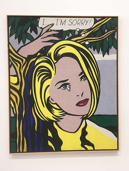 painting of a blond women with yellow t shirt and the text: I...I'AM SORRY